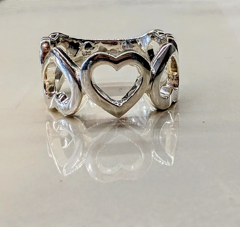 women's rings with bold gemstone center -Silver Hearts Ring