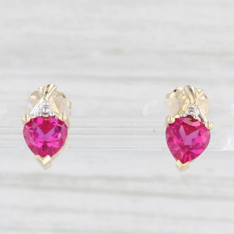 women's earrings with chandelier design -1.20ctw Lab Created Ruby Heart Stud Earrings 10k Yellow Gold