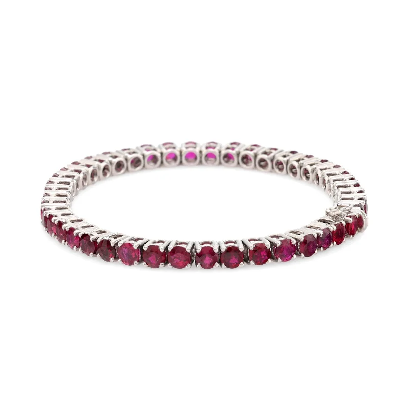 women's bracelets with solid finish -Puig Doria 15 carat total weight ruby 18k white gold tennis bracelet