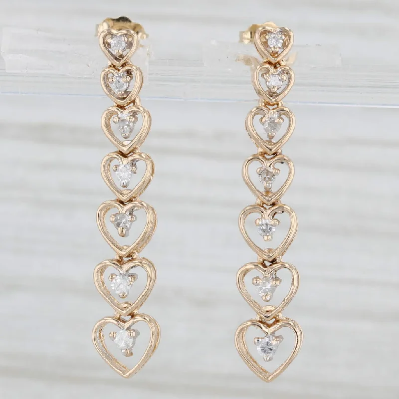 women's earrings with engraved details -0.20ctw Diamond Hearts Journey Dangle Earrings 14k Yellow Gold Pierced Drops