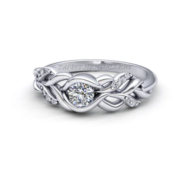 women's engagement rings with bold band -CELTIC PLEAT PAVE RING WITH FLUSH SET DIAMOND IN 9 CT WHITE GOLD