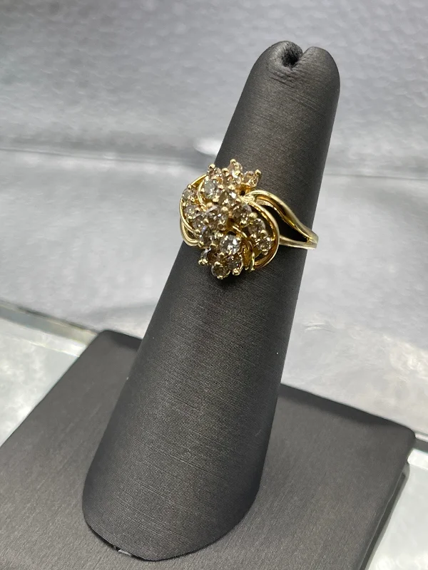 women's engagement rings with baguette-cut side stones -Ladies Gorgeous 14 Karat Yellow Gold Diamond Swirl Floral Cluster Ring