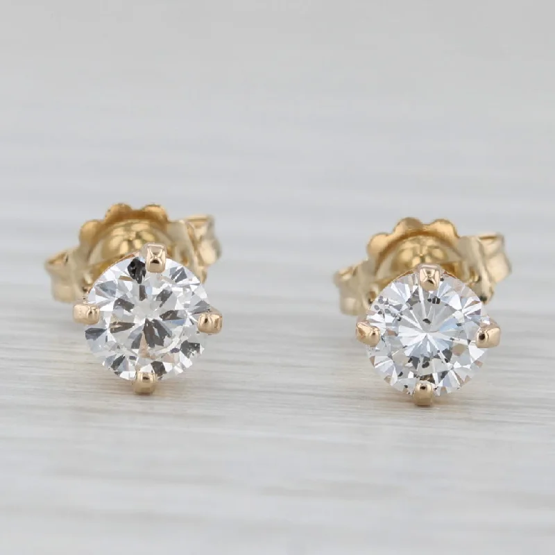 women's earrings with hammered finish -0.66ctw Round Solitaire Diamond Stud Earrings 14k Yellow Gold