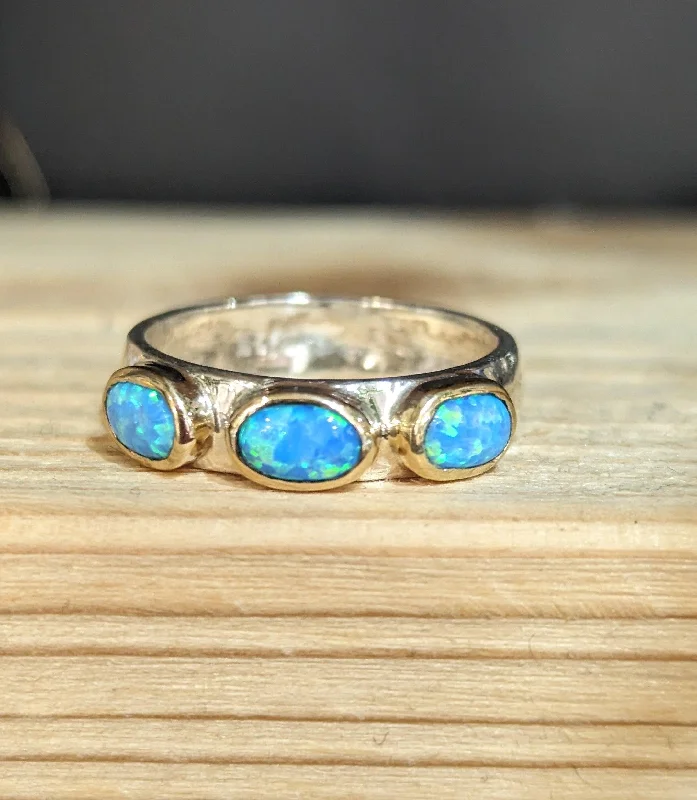 women's rings with twisted metal -Yaron Morhaim 9ct Gold Three Opal Ring