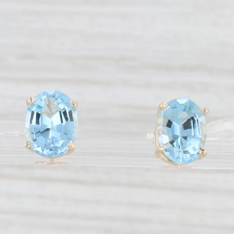 women's earrings with layered hoops -6.60ctw Oval Blue Topaz Solitaire Stud Earrings 14k Yellow Gold