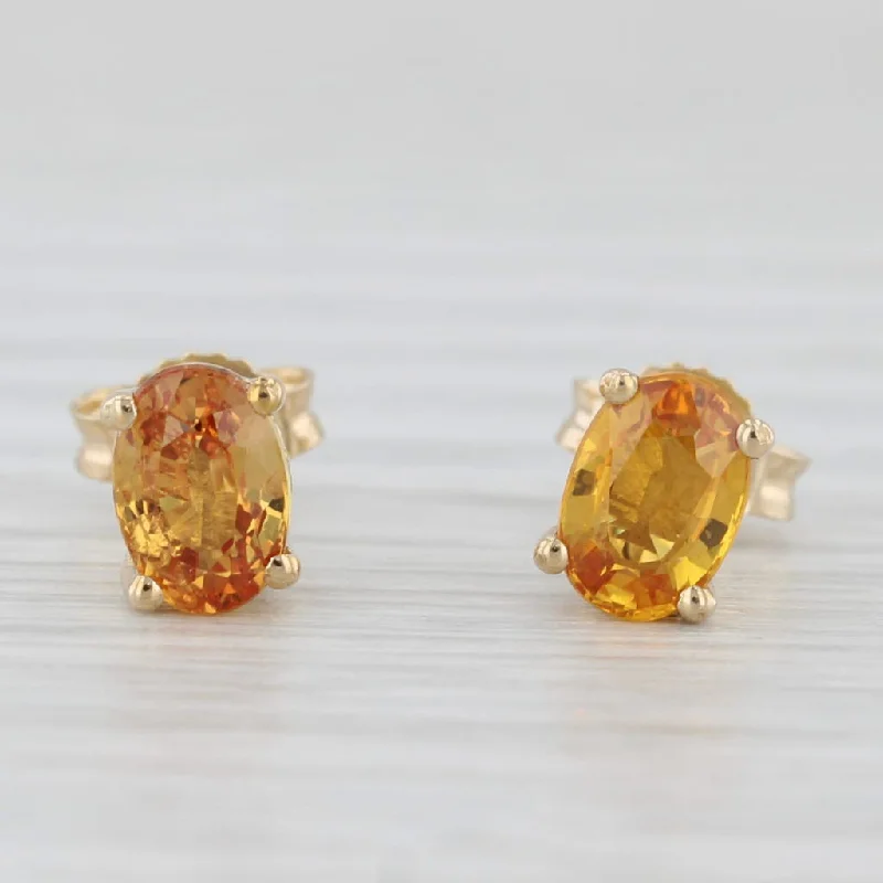 women's earrings with geometric shapes -1.20ctw Oval Orange Citrine Solitaire Stud Earrings 10k Yellow Gold